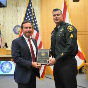 State Attorney Brian Haas and Polk County Sheriff's Sergeant Caleb Swenson